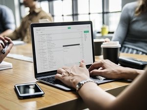 typing on laptop