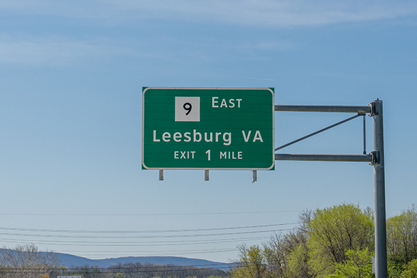 A highway exit sign for Leesburg, VA.